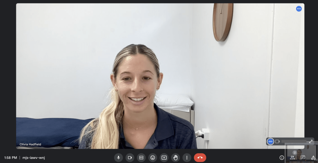 Physiotherapist conducting an online telehealth consultation for a patient in regional Australia.